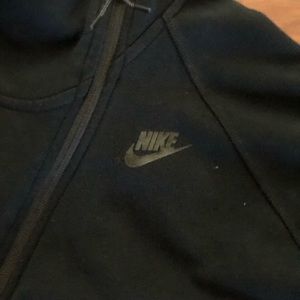 nike asymmetrical zip up!